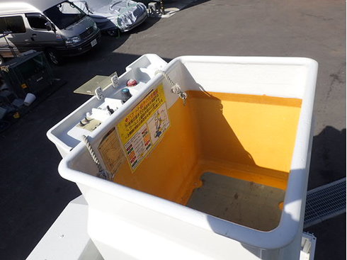 ジャッキ自動　格納　荷台下長物　作動自動格納